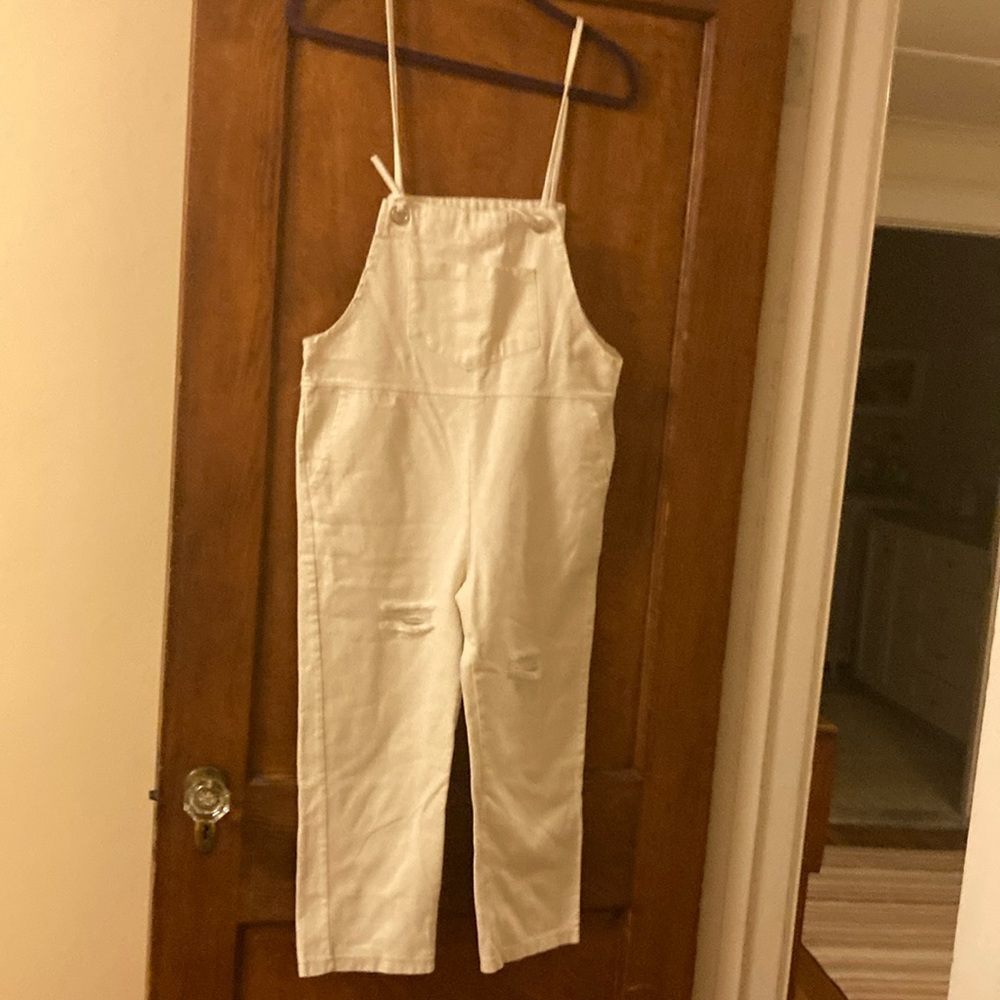 Unique white denim overalls. Bottom at ankle. straight leg. Like new